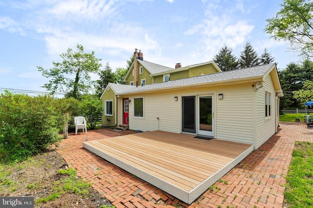522 Creek Rd, Moorestown, NJ 08057 - back of property featuring a deck, roof with shingles, and a patio