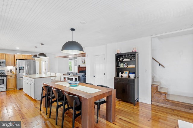 522 Creek Rd, Moorestown, NJ 08057 - dining space featuring light wood-style floors and stairway