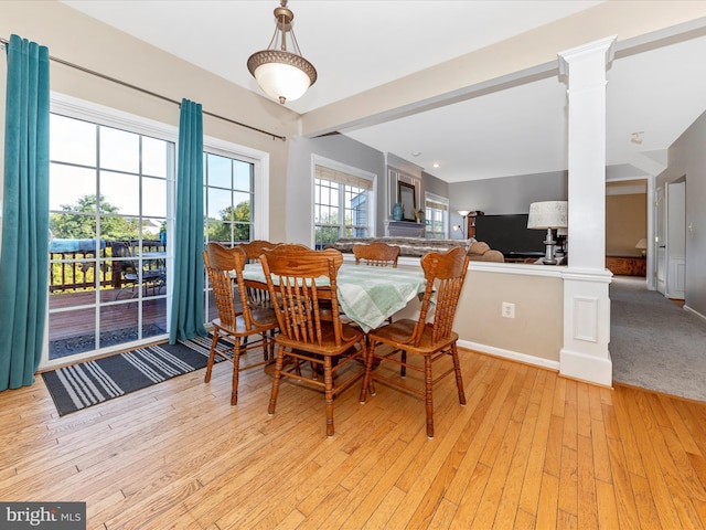 4 Jeffrey Ln, Brunswick, MD 21758 - dining room featuring light wood finished floors and ornate columns