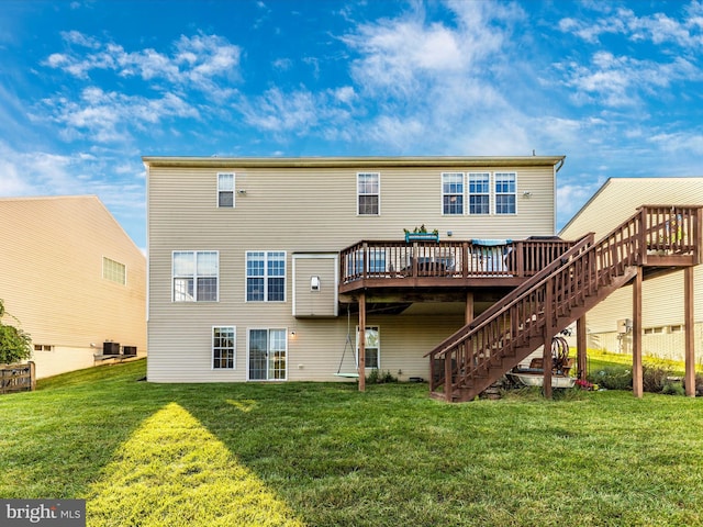 4 Jeffrey Ln, Brunswick, MD 21758 - back of property featuring stairs, a deck, and a yard
