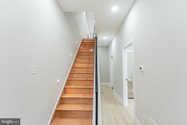 3221 Mercer St, Philadelphia, PA 19134 - stairs with wood finished floors, recessed lighting, and baseboards