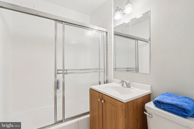 1111 Arlington Blvd Unit 810, Arlington, VA 22209 - bathroom featuring toilet, vanity, and combined bath / shower with glass door