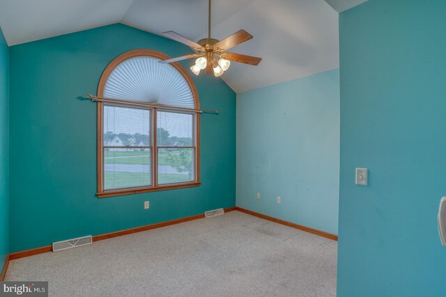 74 Connie Ln, Dover, DE 19901 - carpeted empty room with lofted ceiling, a ceiling fan, and baseboards