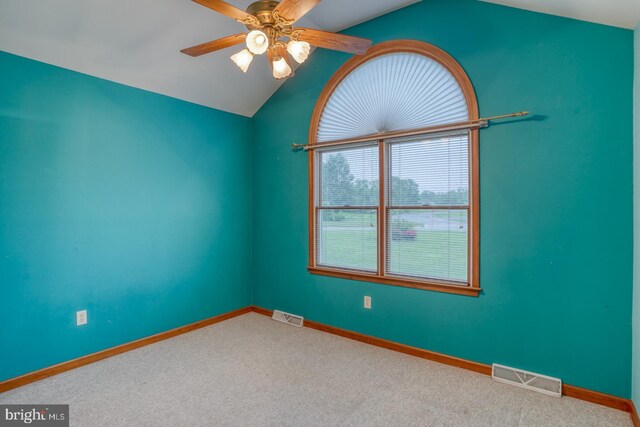74 Connie Ln, Dover, DE 19901 - unfurnished room featuring lofted ceiling, ceiling fan, carpet flooring, and baseboards