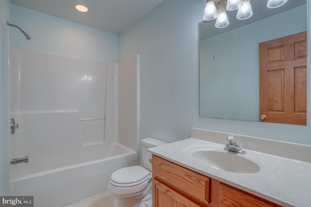 74 Connie Ln, Dover, DE 19901 - bathroom featuring toilet, vanity,  shower combination, and a chandelier