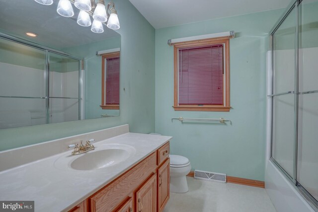 74 Connie Ln, Dover, DE 19901 - bathroom featuring vanity, toilet, baseboards, a chandelier, and recessed lighting
