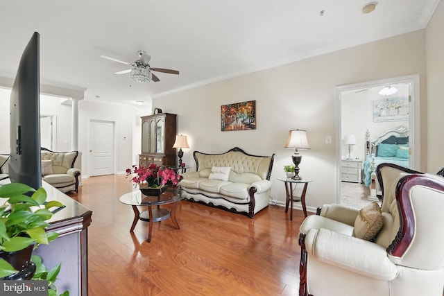 9713 Handerson Pl Unit 104, Manassas Park, VA 20111 - living area featuring ornamental molding, a ceiling fan, wood finished floors, and baseboards