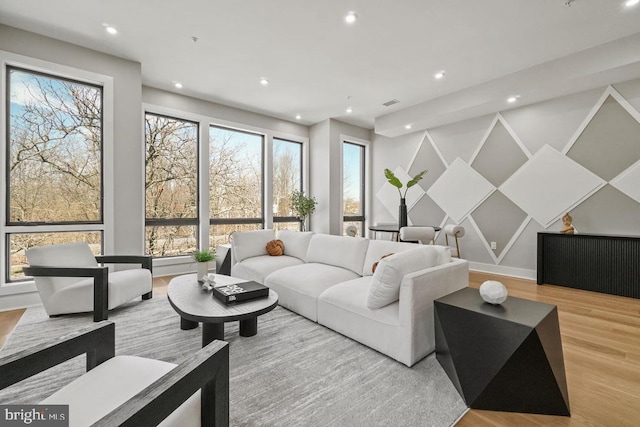 living area featuring recessed lighting and wood finished floors