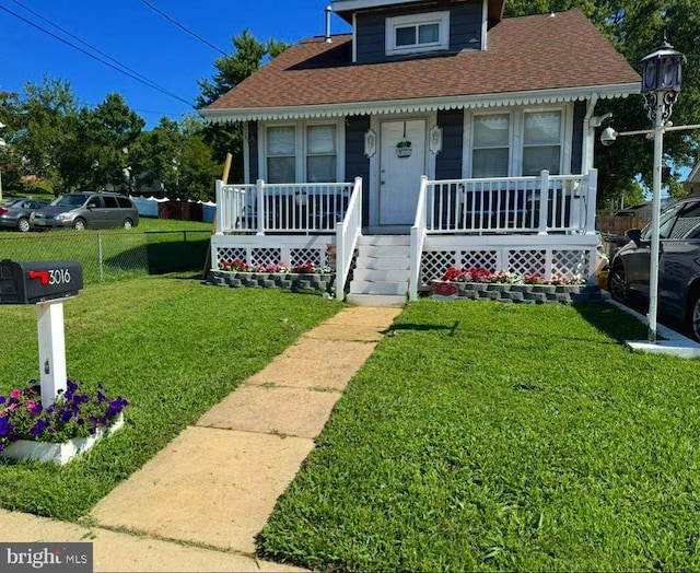 3016 Pennsylvania Ave, Lansdowne, MD 21227 - bungalow-style home featuring covered porch and a shingled roof