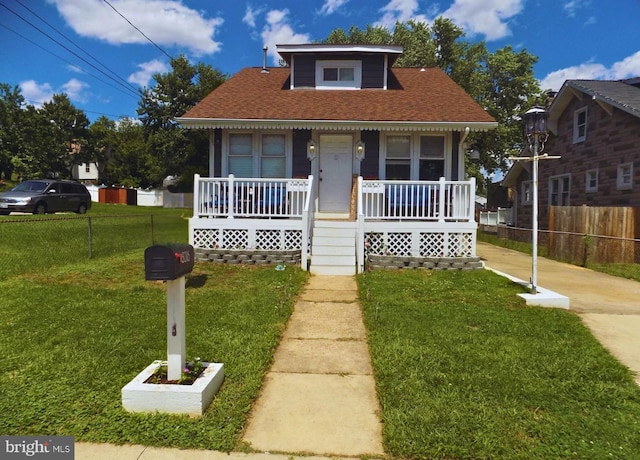 3016 Pennsylvania Ave, Lansdowne, MD 21227 - bungalow-style house featuring a porch and roof with shingles