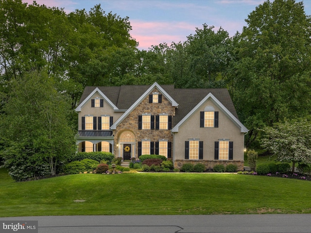 130 Waterfall Ln, Landenberg, PA 19350 - view of front of home with stone siding, a front lawn, and stucco siding