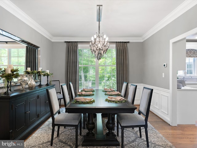130 Waterfall Ln, Landenberg, PA 19350 - dining space featuring a chandelier, ornamental molding, light wood-style floors, and wainscoting