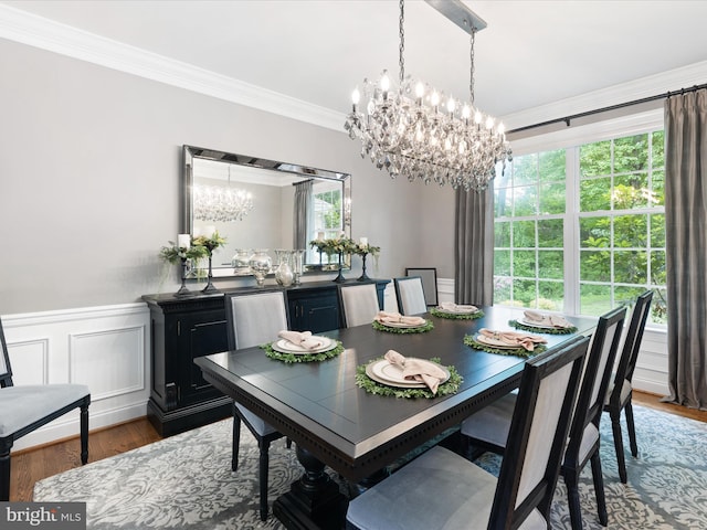 130 Waterfall Ln, Landenberg, PA 19350 - dining space featuring a chandelier, ornamental molding, wood finished floors, and a wainscoted wall