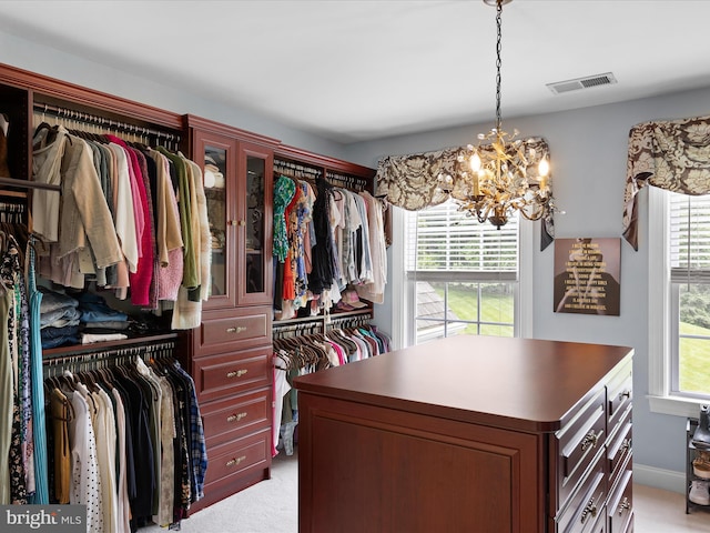130 Waterfall Ln, Landenberg, PA 19350 - walk in closet featuring a chandelier and light carpet