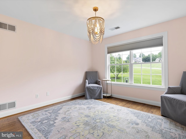 130 Waterfall Ln, Landenberg, PA 19350 - living area with a chandelier, baseboards, and wood finished floors