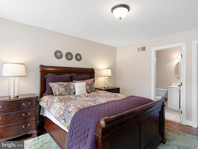 130 Waterfall Ln, Landenberg, PA 19350 - bedroom with dark wood-style flooring and ensuite bath
