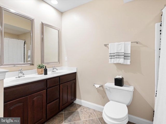 130 Waterfall Ln, Landenberg, PA 19350 - full bath featuring double vanity, toilet, and baseboards