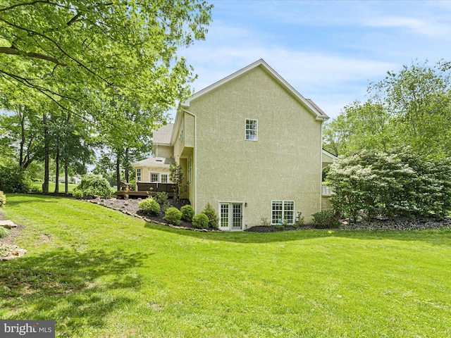 130 Waterfall Ln, Landenberg, PA 19350 - view of home's exterior featuring stucco siding, a yard, and french doors