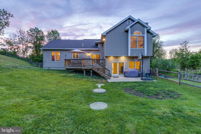 15039 Jarrettsville Pike, Monkton, MD 21111 - back of property at dusk with a deck, stairway, and a patio area