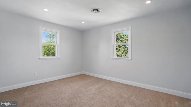 8014 Ritchie Hwy, Pasadena, MD 21122 - empty room featuring light colored carpet, plenty of natural light, baseboards, and recessed lighting