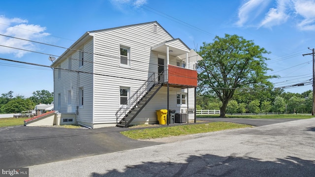 8014 Ritchie Hwy, Pasadena, MD 21122 - view of front of house featuring stairway and a balcony