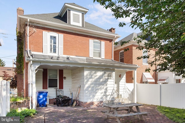 408 Frederick St, Hanover, PA 17331 - back of house with a chimney and brick siding