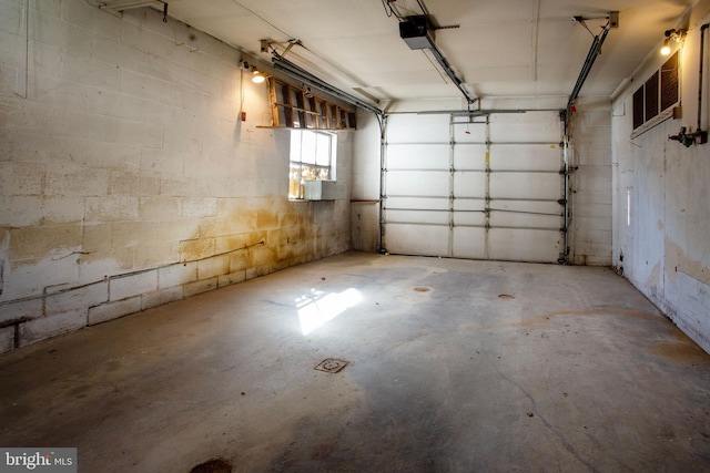 408 Frederick St, Hanover, PA 17331 - garage with a garage door opener and concrete block wall