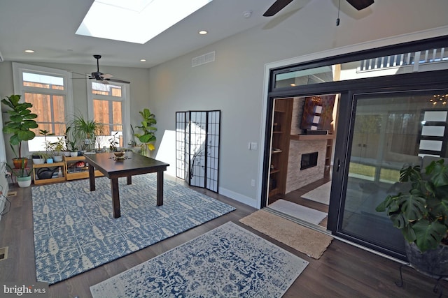 7012 Silverwood St, Philadelphia, PA 19128 - home office with a ceiling fan, a skylight, wood finished floors, and recessed lighting