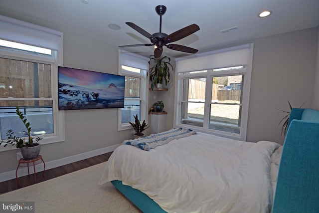 7012 Silverwood St, Philadelphia, PA 19128 - bedroom featuring multiple windows, wood finished floors, recessed lighting, baseboards, and a ceiling fan