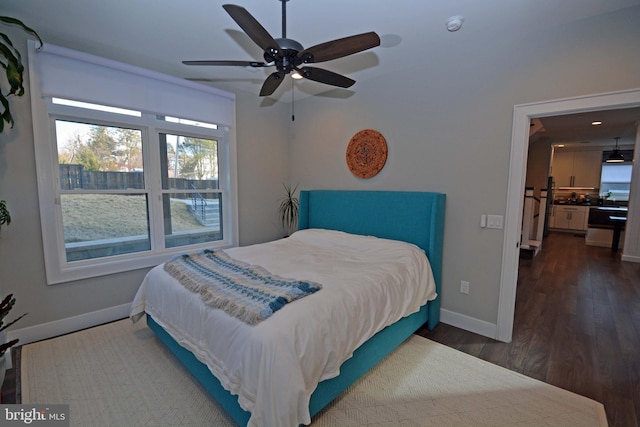 7012 Silverwood St, Philadelphia, PA 19128 - bedroom with baseboards, dark wood-style flooring, and ceiling fan