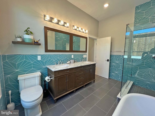 7012 Silverwood St, Philadelphia, PA 19128 - full bath featuring tile walls, tile patterned floors, walk in shower, a freestanding tub, and double vanity
