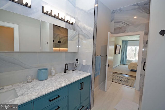 7012 Silverwood St, Philadelphia, PA 19128 - ensuite bathroom with double vanity and tile patterned flooring