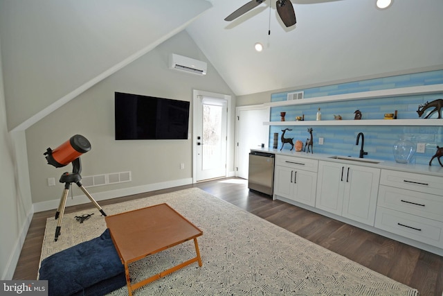 7012 Silverwood St, Philadelphia, PA 19128 - kitchen featuring a sink, open shelves, stainless steel dishwasher, a wall unit AC, and a ceiling fan