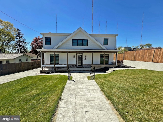 7012 Silverwood St, Philadelphia, PA 19128 - modern farmhouse featuring covered porch