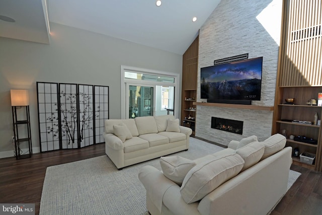 7012 Silverwood St, Philadelphia, PA 19128 - living room featuring high vaulted ceiling, a fireplace, wood finished floors, recessed lighting, and baseboards