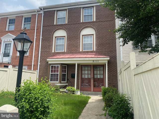 8111 Oaklake Ct, Alexandria, VA 22309 - townhome / multi-family property with brick siding, fence, and french doors
