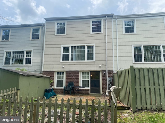8111 Oaklake Ct, Alexandria, VA 22309 - back of house featuring brick siding