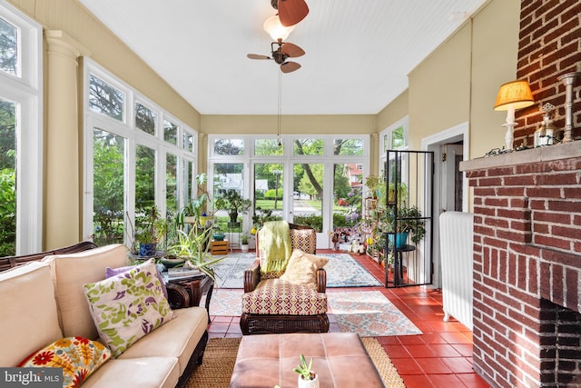 sunroom / solarium featuring french doors and tile patterned floors