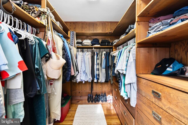 spacious closet featuring wood finished floors