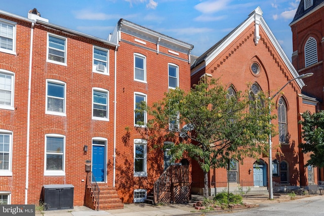 110 W Hamburg St, Baltimore, MD 21230 - view of front of house featuring brick siding and entry steps