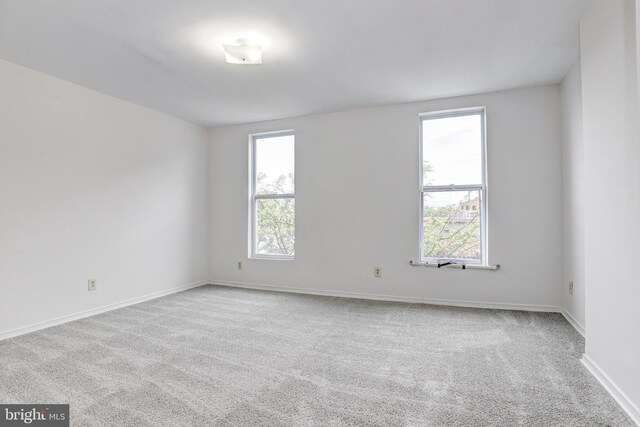 110 W Hamburg St, Baltimore, MD 21230 - carpeted empty room featuring healthy amount of natural light and baseboards
