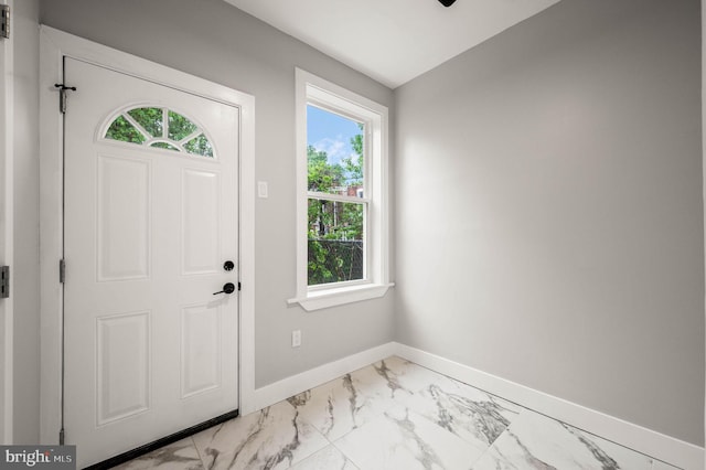 5113 W Thompson St, Philadelphia, PA 19131 - entryway featuring baseboards and marble finish floors