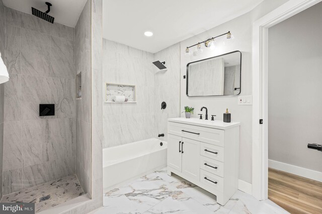 5113 W Thompson St, Philadelphia, PA 19131 - full bathroom with vanity, recessed lighting, a combined bath / shower with rainfall shower, baseboards, and marble finish floors