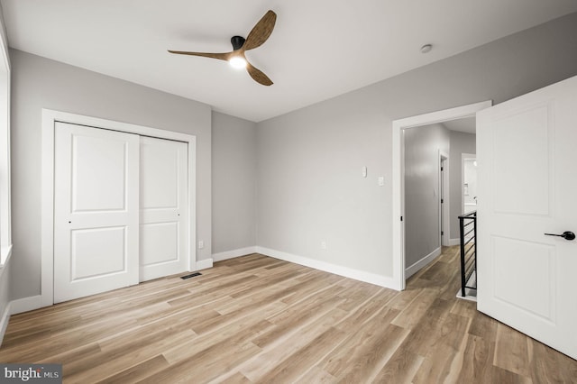 5113 W Thompson St, Philadelphia, PA 19131 - unfurnished bedroom with light wood-type flooring, baseboards, a closet, and a ceiling fan