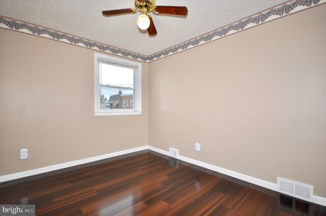 8922 Brous Ave, Philadelphia, PA 19152 - empty room featuring baseboards, dark wood finished floors, and ceiling fan
