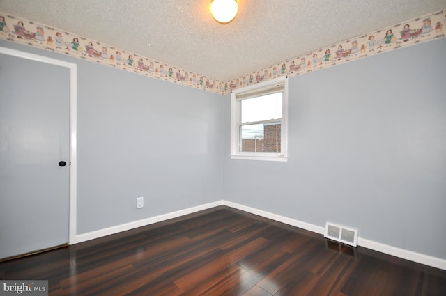 8922 Brous Ave, Philadelphia, PA 19152 - empty room with baseboards, a textured ceiling, and wood finished floors
