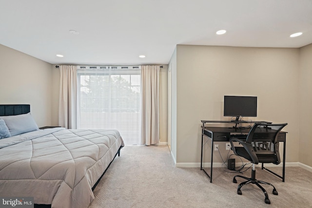 bedroom with light carpet, an office area, baseboards, and recessed lighting