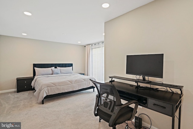 carpeted bedroom featuring recessed lighting and baseboards