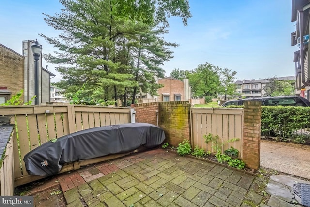view of patio with fence