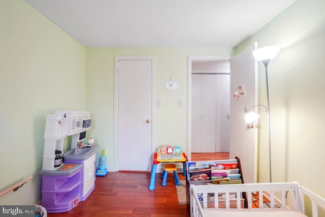 bedroom with wood finished floors